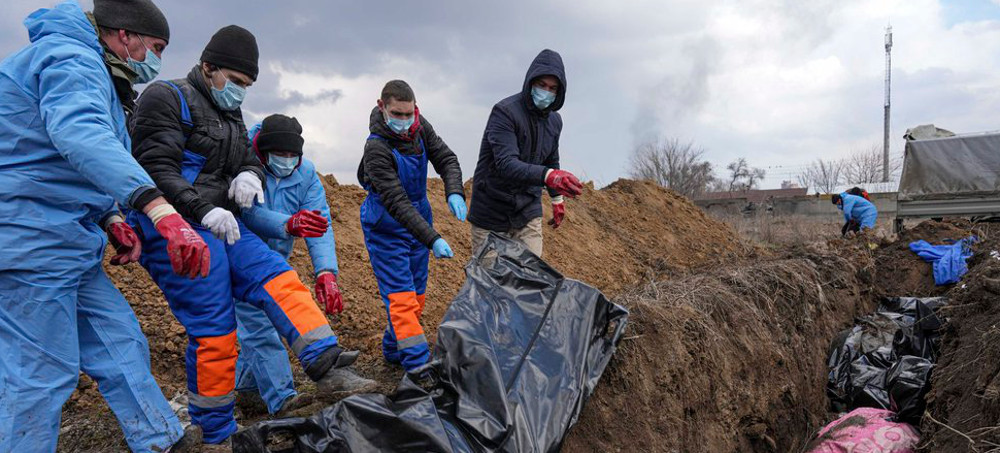 Russian Forces Accused of Secret Burials of Mariupol Civilians