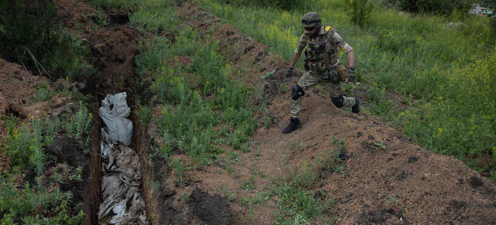 Near Embattled Cities in Ukraine, an Uncovered Mass Grave Grows