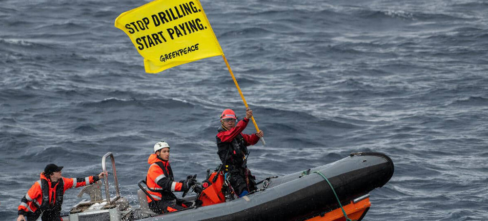 Greenpeace Activists Occupy Shell Oil Platform on North Sea Bound Vessel