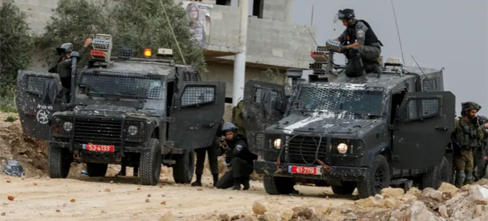 Israeli Army Kills Palestinian, Settlers March to Illegal Outpost