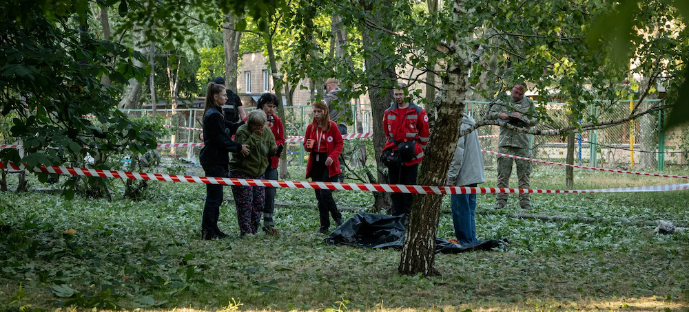 Mother and Child's Desperate Run for Cover in Kyiv Ends Outside Locked Shelter