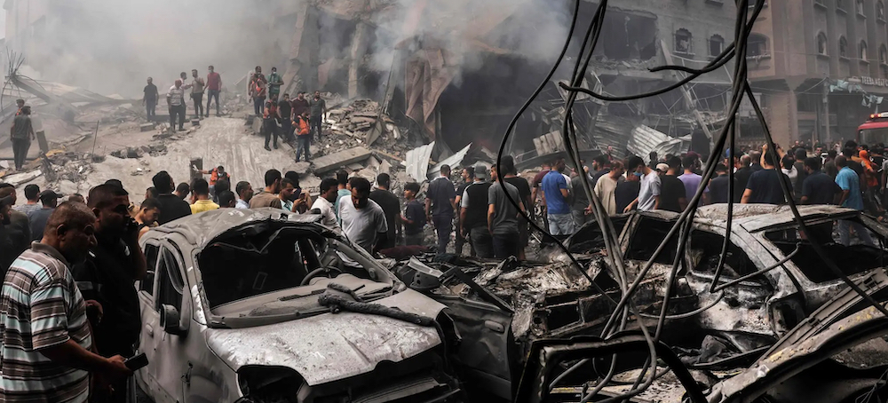 Israeli Airstrike Hits Marketplace in Gazan Refugee Camp, Killing Dozens