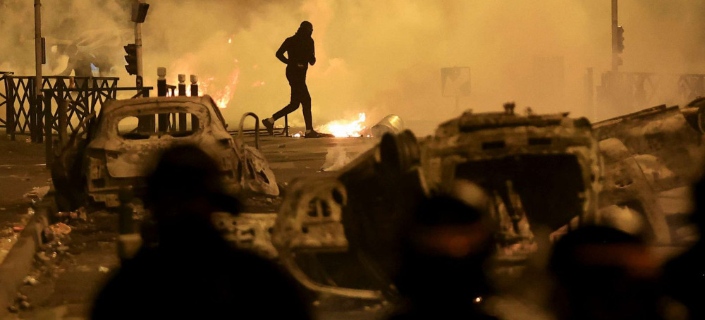 Macron Readies Response as France Plunged Into Crisis by Police Killing of Teen