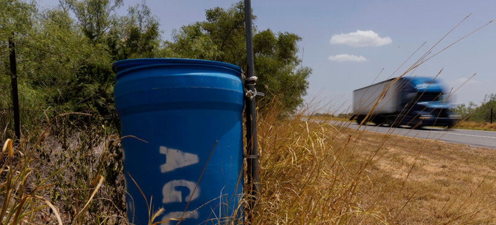 Barrels of Drinking Water for Migrants Walking Through Texas Have Disappeared