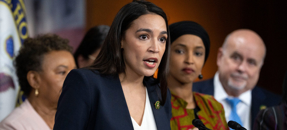 Why Is the Squad Backing Biden So Forcefully?