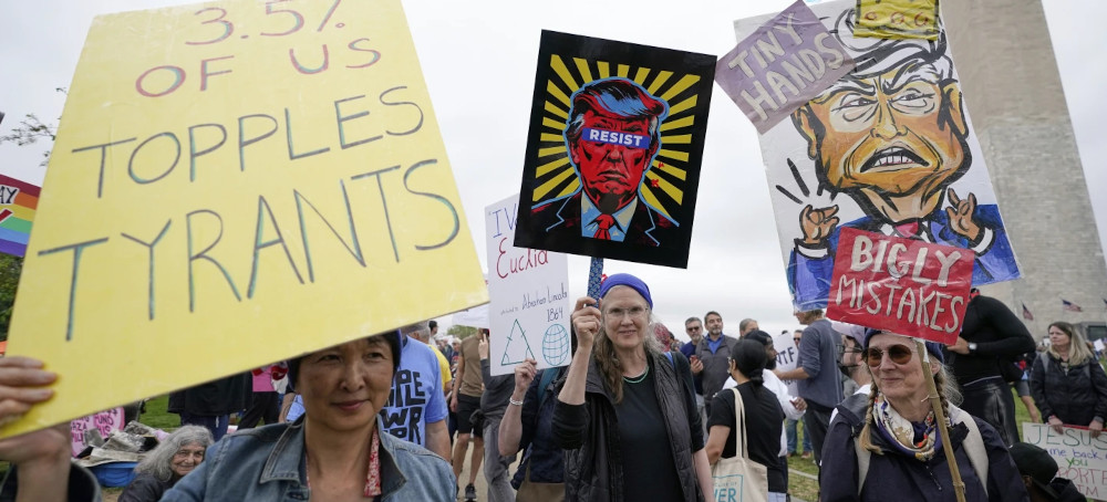 Protesters Tee Off Against Trump and Musk in ‘Hands Off!’ Rallies Across the US