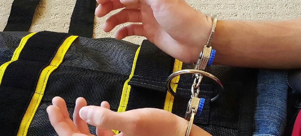 ICE’s Use of Full-Body Restraints During Deportations Raises Concerns Over Inhumane Treatment