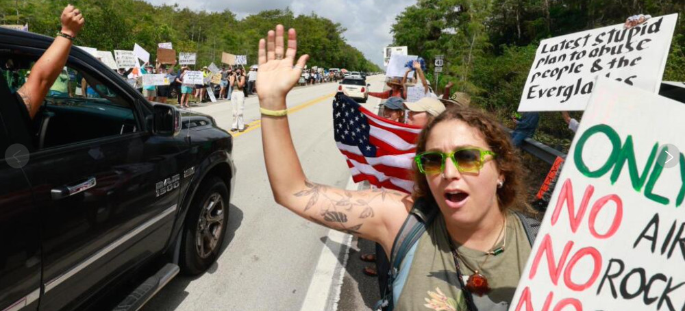 Protesters Line Highway in Florida Everglades to Oppose ‘Alligator Alcatraz’