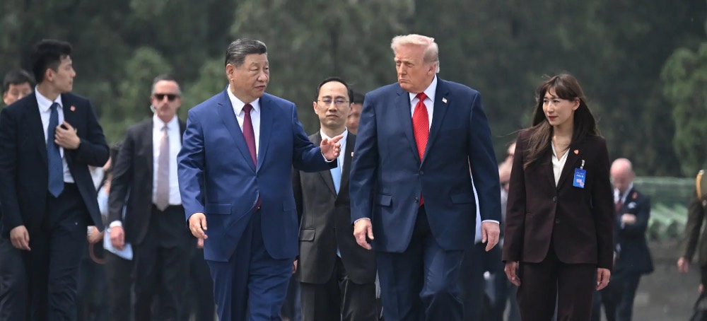 Flags, Flattery and a Blunt Warning on Trump’s First Day in China