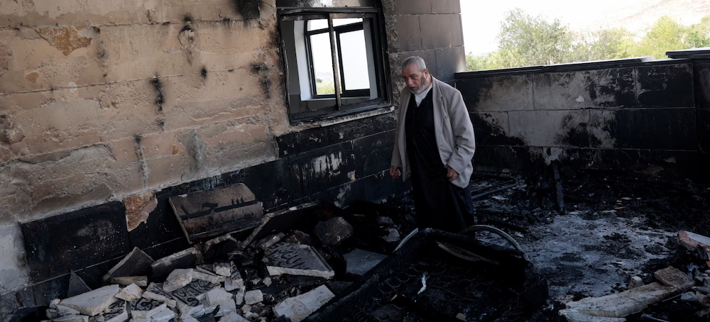 Israeli Settlers Set Fire to West Bank Mosques After Deadly Clash