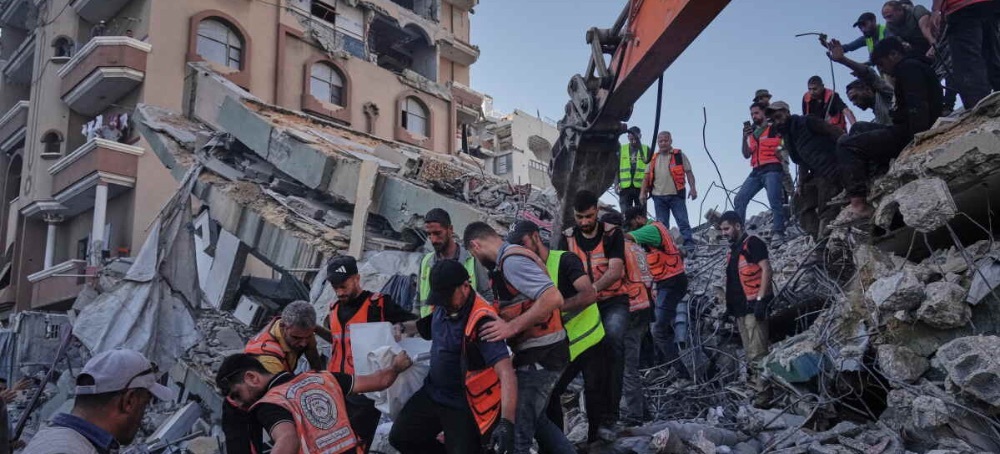 Building Damaged by Israeli Strikes Collapses in Gaza, Killing 21 as Perilous Living Conditions Persist