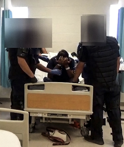 A screenshot from footage obtained from ICE shows Ajay Kumar after two failed attempts by medical staff to insert a nasogastric tube at the El Paso Service Processing Center on Aug. 14, 2019.